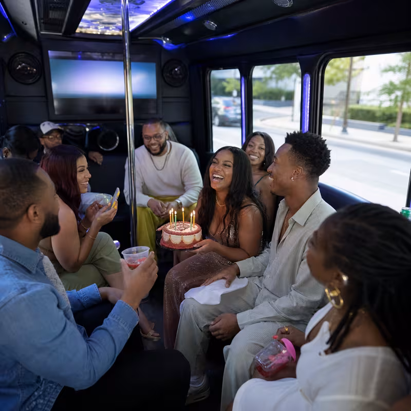 Black Mercedes Sprinter van staged for an Naperville Birthday Transportation group