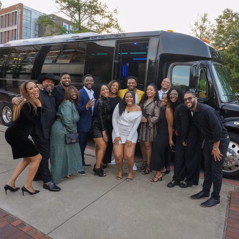 Party bus interior with wraparound leather seating and LED lighting in Naperville