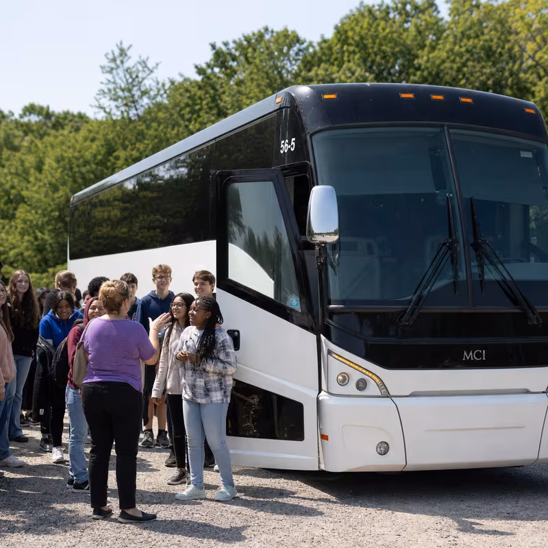Black Mercedes Sprinter van staged for an Naperville School Transportation group