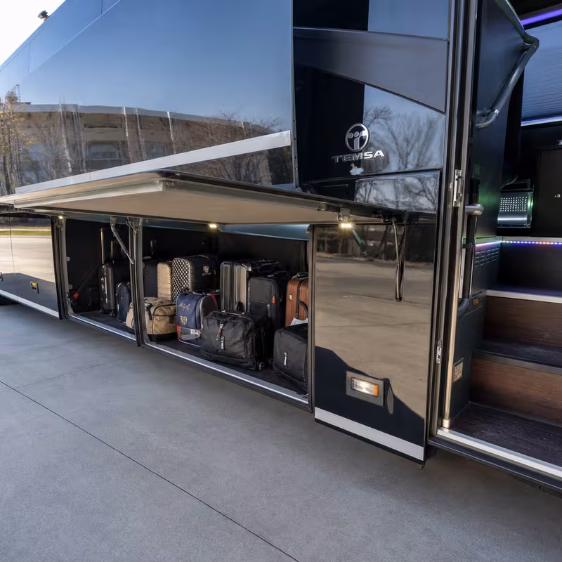 Party bus interior with wraparound leather seating and LED lighting in Naperville